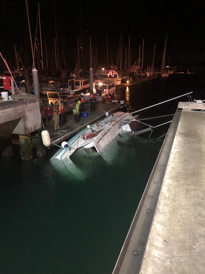 A 38-foot wooden fishing trawler sank in Port Townsend Bay off of Boat Haven Marina, but was able to get towed in and pulled out of the water, preventing its 100  gallons of fuel from polluting the bay.